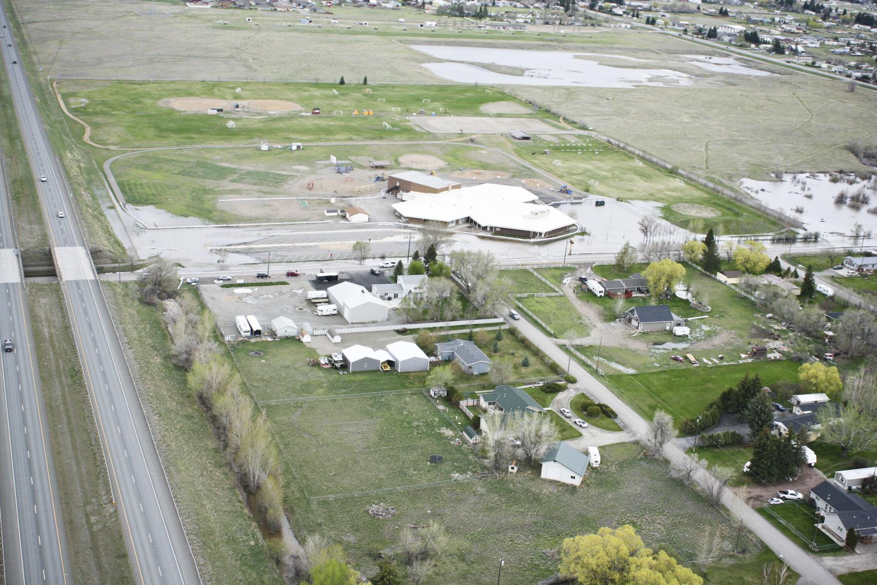Flooding in the Helena Valley is shown via helicopter
